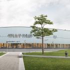 Backavallens sporthall byggs i trä med stående träpanel och stora glaspartier. Visionsbild: D-office