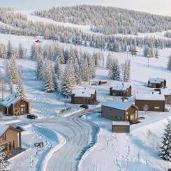 De tio fjällstugorna ligger mitt i backen. Foto: Derome